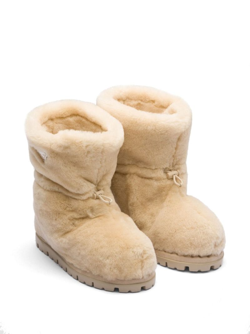 triangle-logo shearling boots